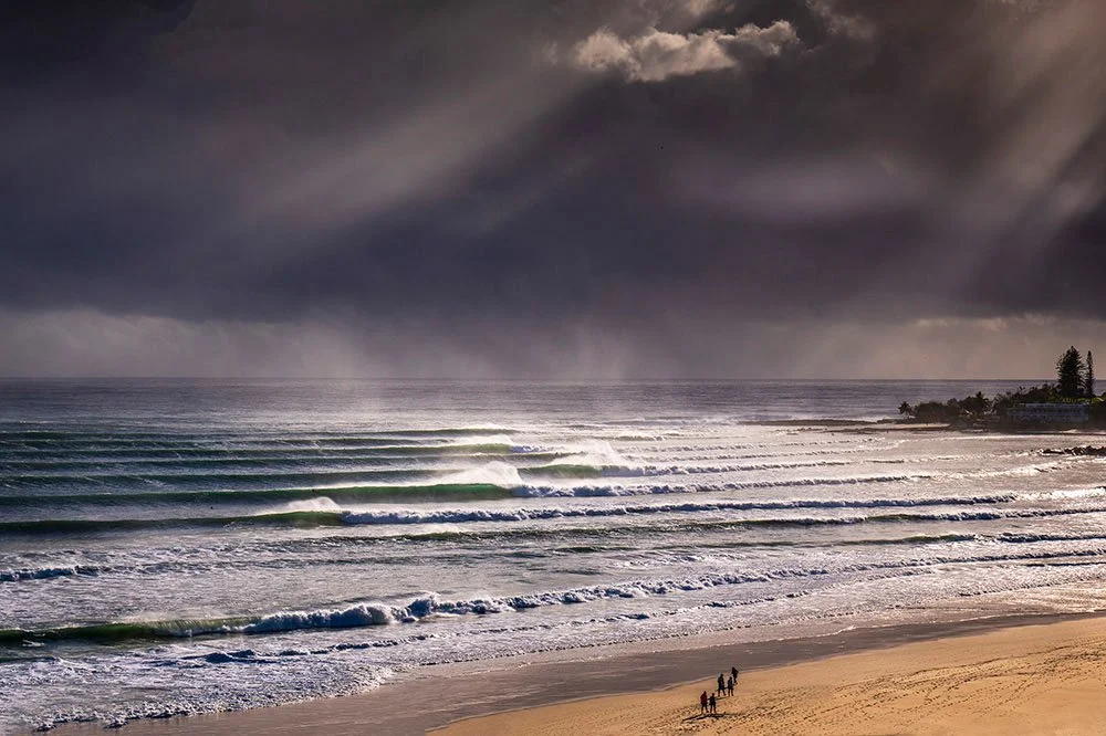 Perfect lines of swell traced the points from Snapper to Coolangatta, each barrel illuminated as if by divine intent.