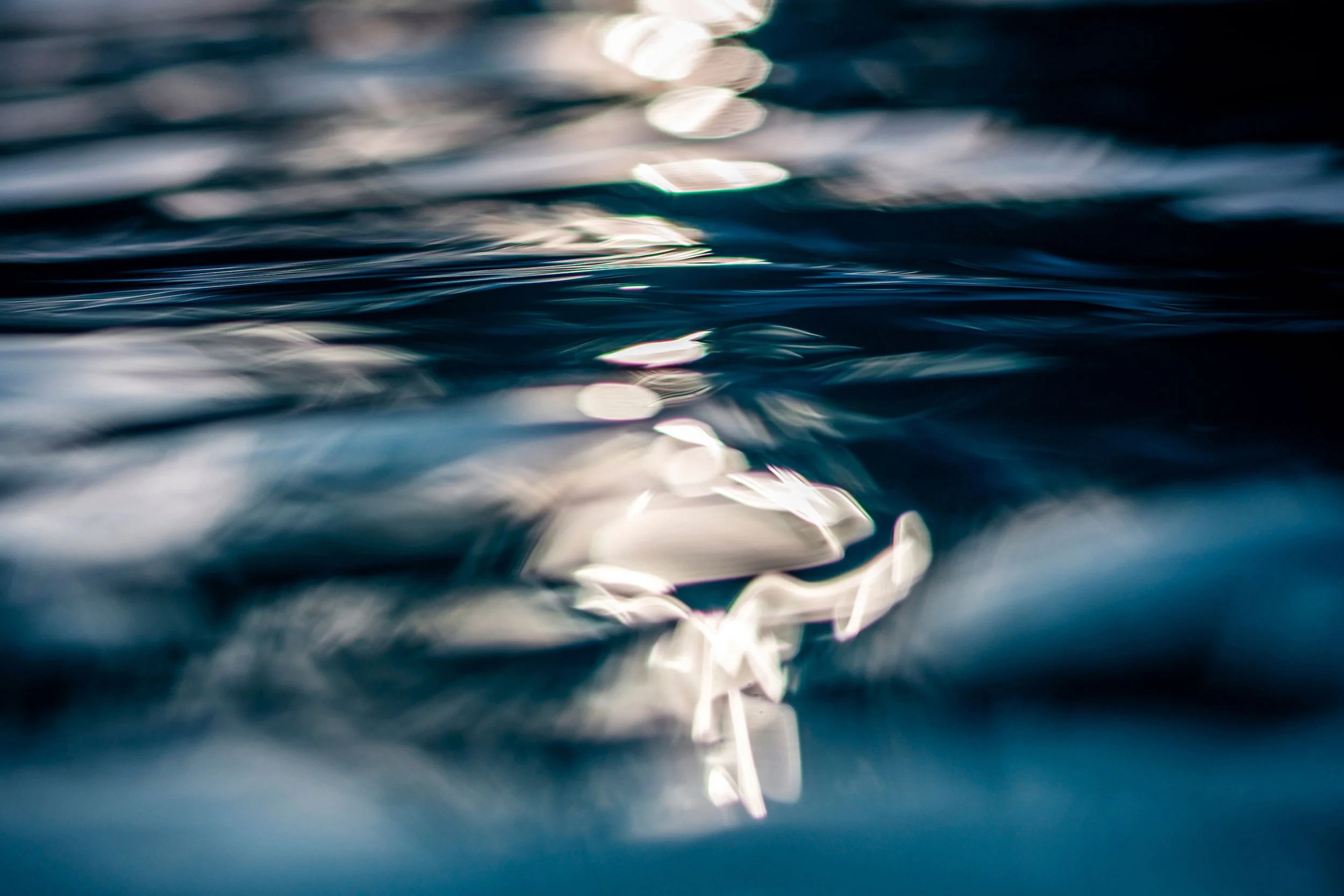 Stunning Blue Ocean reflections at sunrise from Ted Grambeau's Sealevel Ocean Art Collection of photography prints.