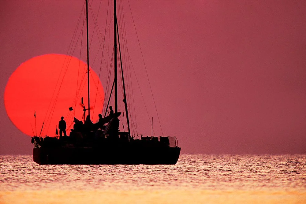 'SAILOR'S DELIGHT' - Sunset over a surf yacht off Mozambique.