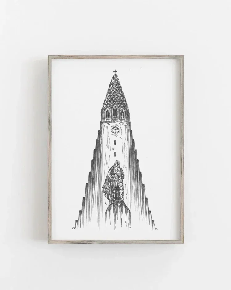 Framed black ink architectural sketch of Hallgrímskirkja in Reykjavík with the Leif Erikson statue in the foreground, shown as a minimalist Scandinavian wall art print.