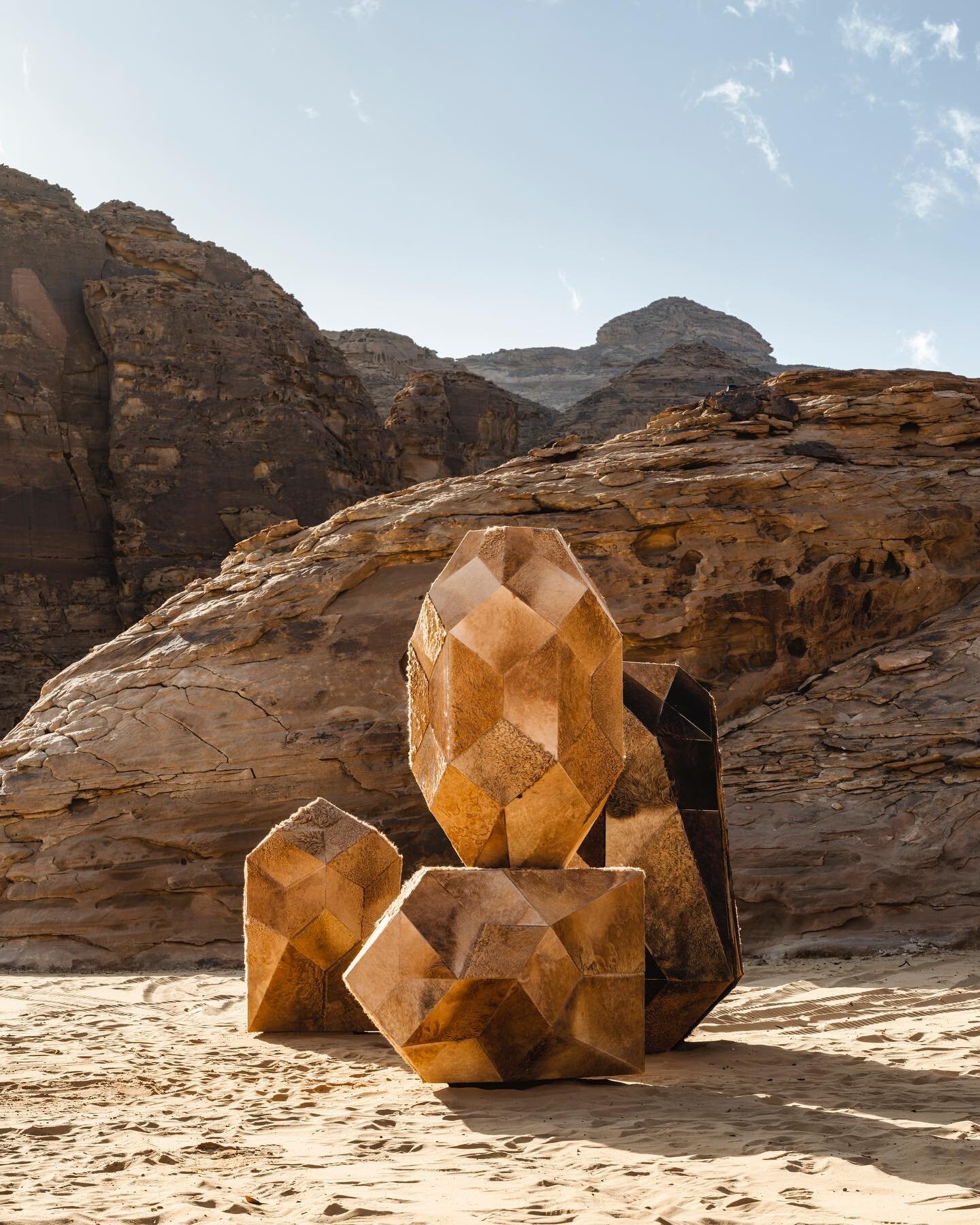 &ldquo;Camoulflage 2.0&rdquo; commissions by @rcu_sa for @_desertx AlUla 2022. Is a sculpture uses discarded camel skins on
an abstract, geometric base, resembling a rock formation in the desert;
like a camouflage, these camel hide sculptures merge i