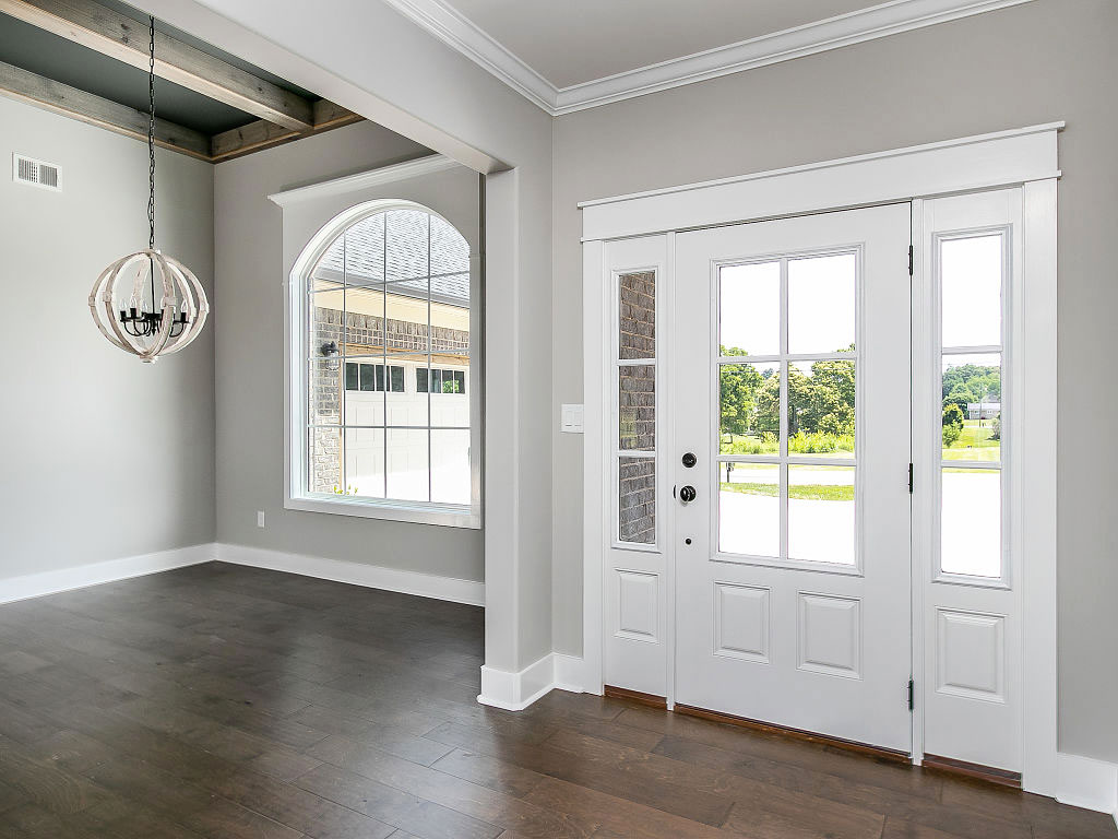 minimal-entry-way-chandelier-cypress-woods-289allisonroad.jpg