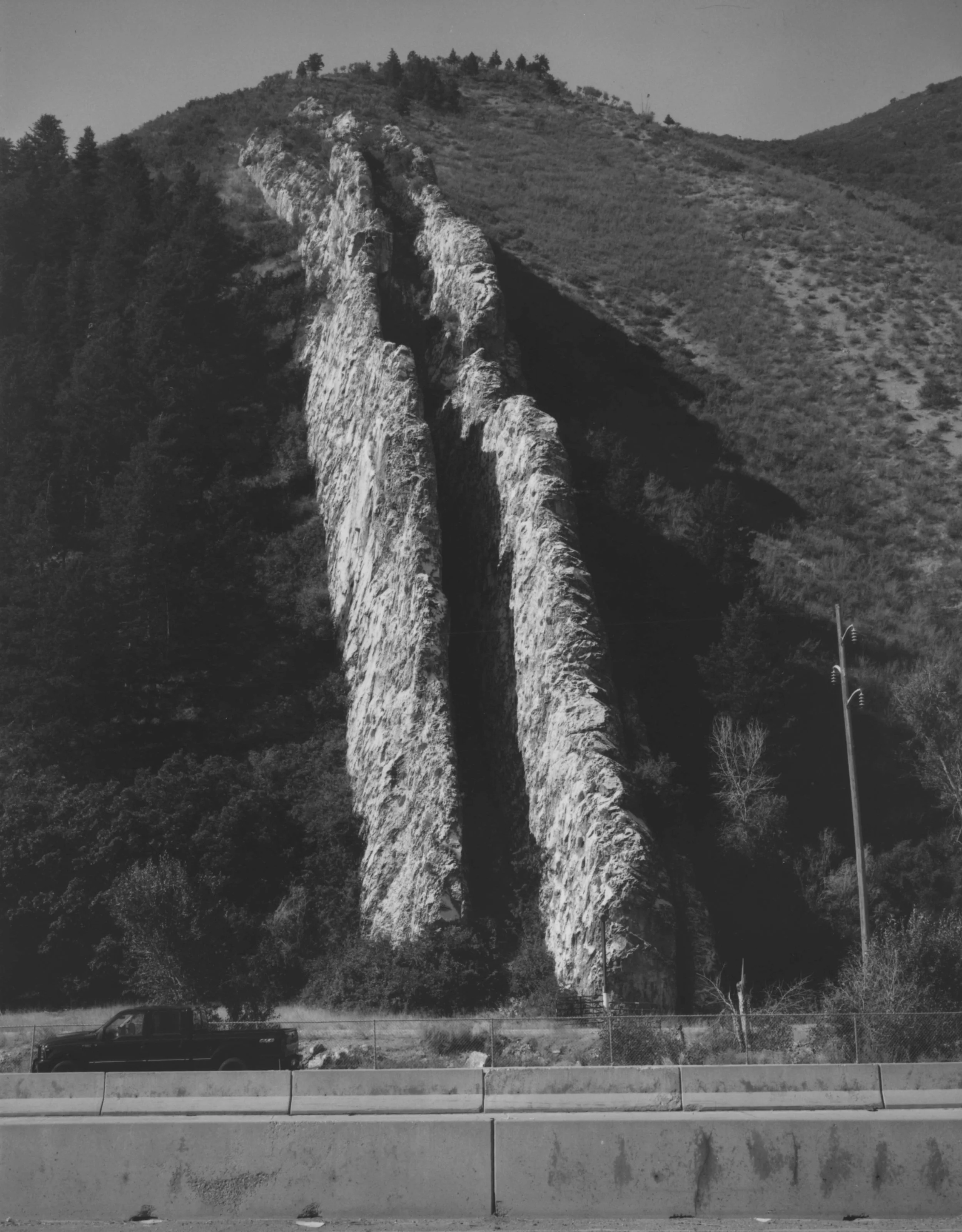 Devil’s Slide is a bizarre, giant-size limestone chute, located on the south side of Interstate- 84 in Weber Canyon, Utah. This site is a tilted remnant of sediments deposited in a sea that occupied Utah’s distant geologic past.