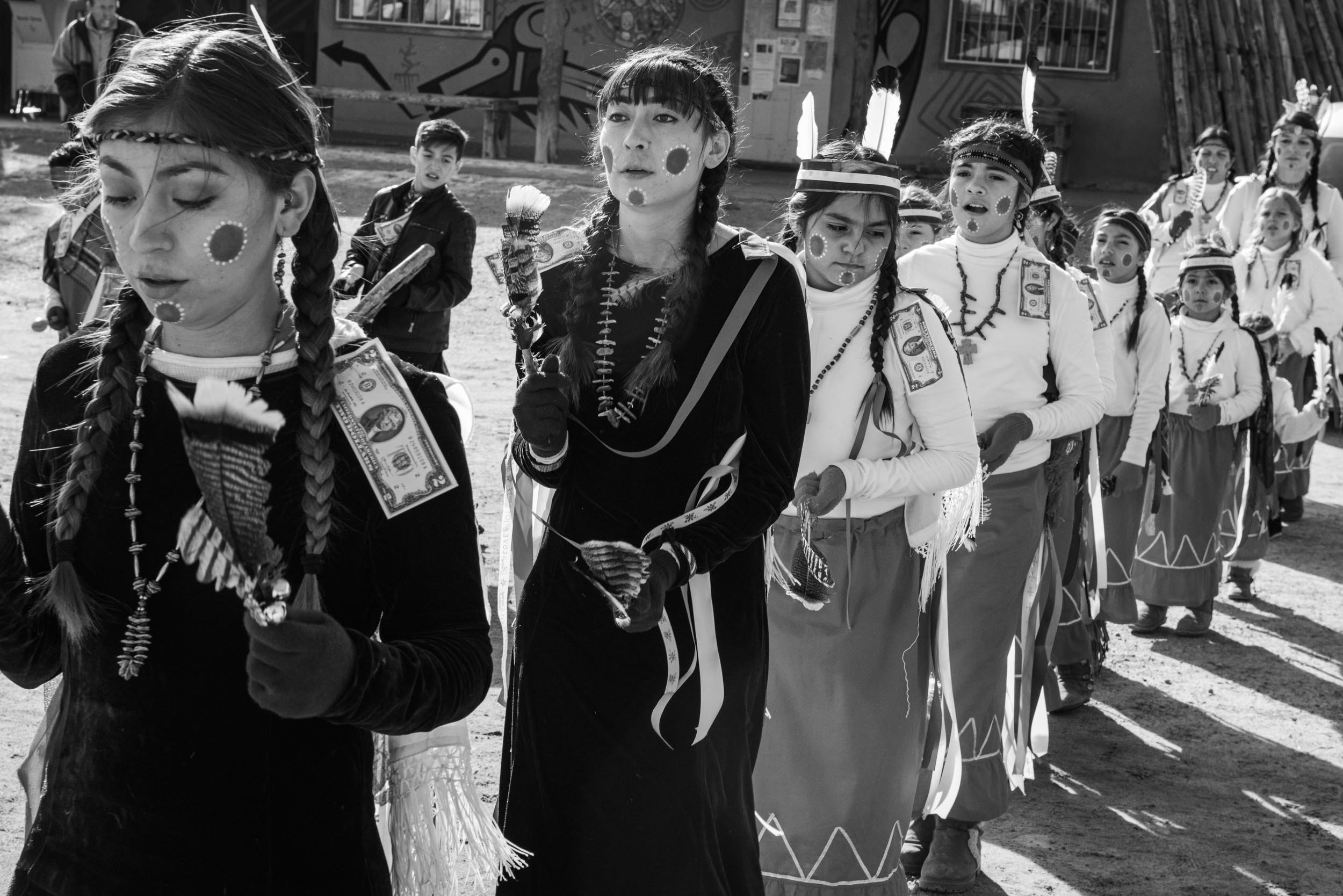  Abiquiú’s Santo Tomás feast day ceremony culminates on Sunday with El Cautivo (The Captive) Dance, which has been performed at the pueblo for more than 150 years. Dancers dress as their ancestors, with face paint, feather hair ornaments, and ankle b