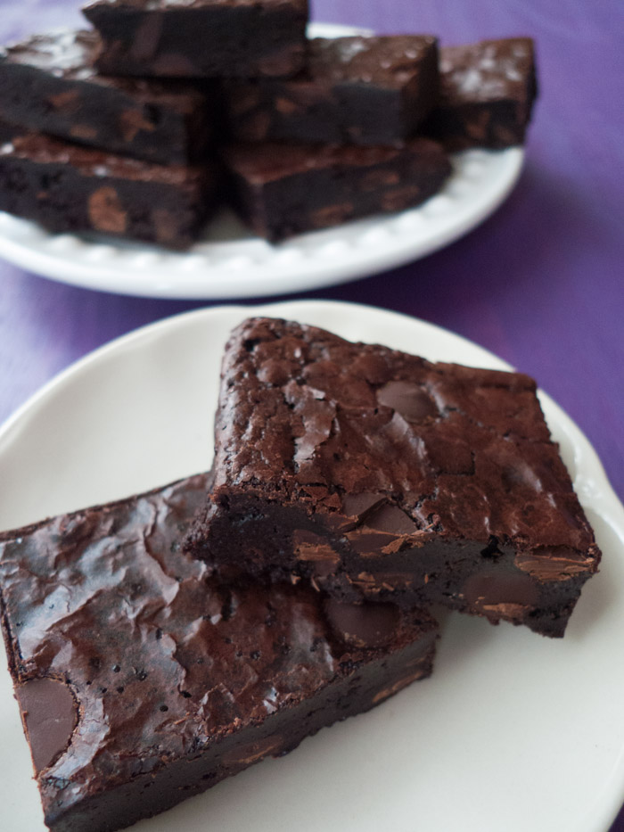 These decadent brownies are low-FODMAP, gluten-free and dairy. But the best part is that they're so easy and can be made in one bowl! They're rich and fudgy and have beautiful shiny tops. If you need a go-to treat on the low-FODMAP diet, this should do it. Click through for the recipe!