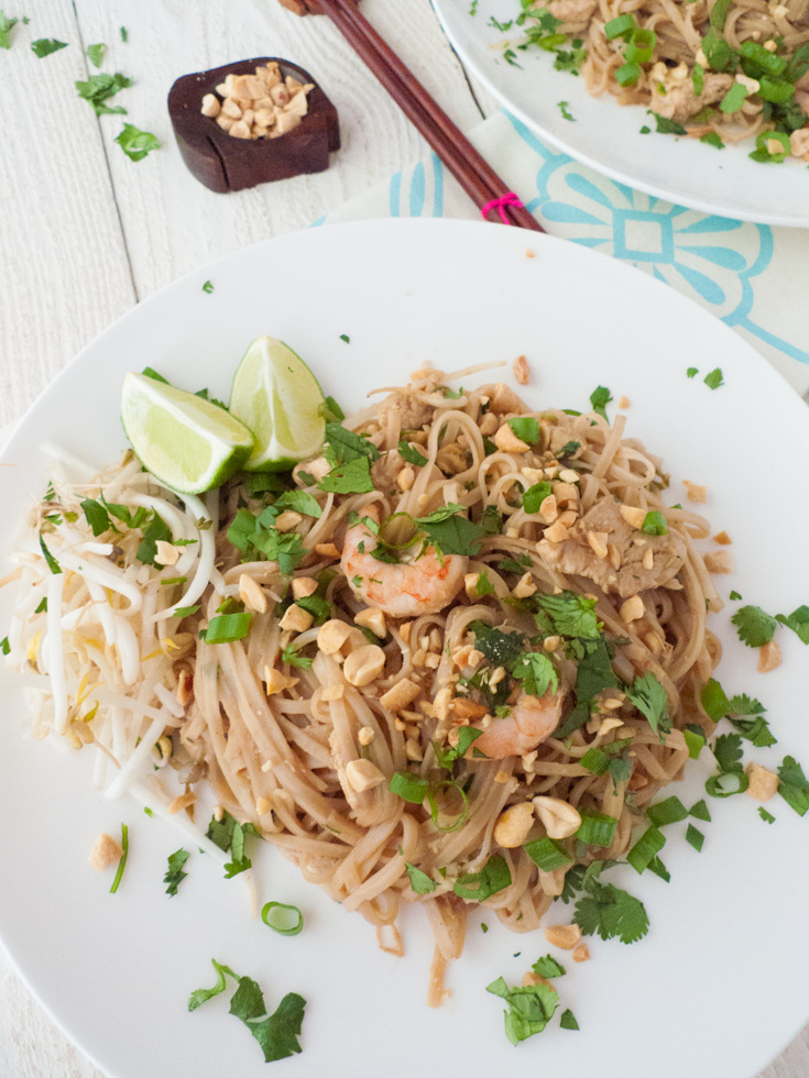 These Pad Thai noodles with chicken and shrimp are part of my healthy AND low FODMAP Thai menu! Your side dish is Thai Cantaloupe-Cucumber Salad with Shrimp (and a tangy Asian dressing). Click through to get both recipes!