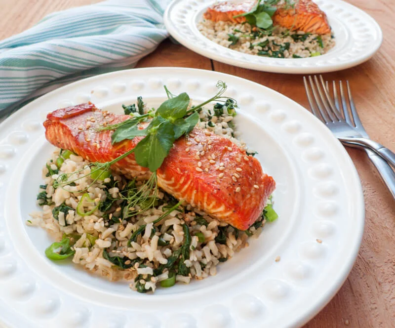 This elegant maple-marinated salmon with spinach-sesame rice is delicious AND healthy!
