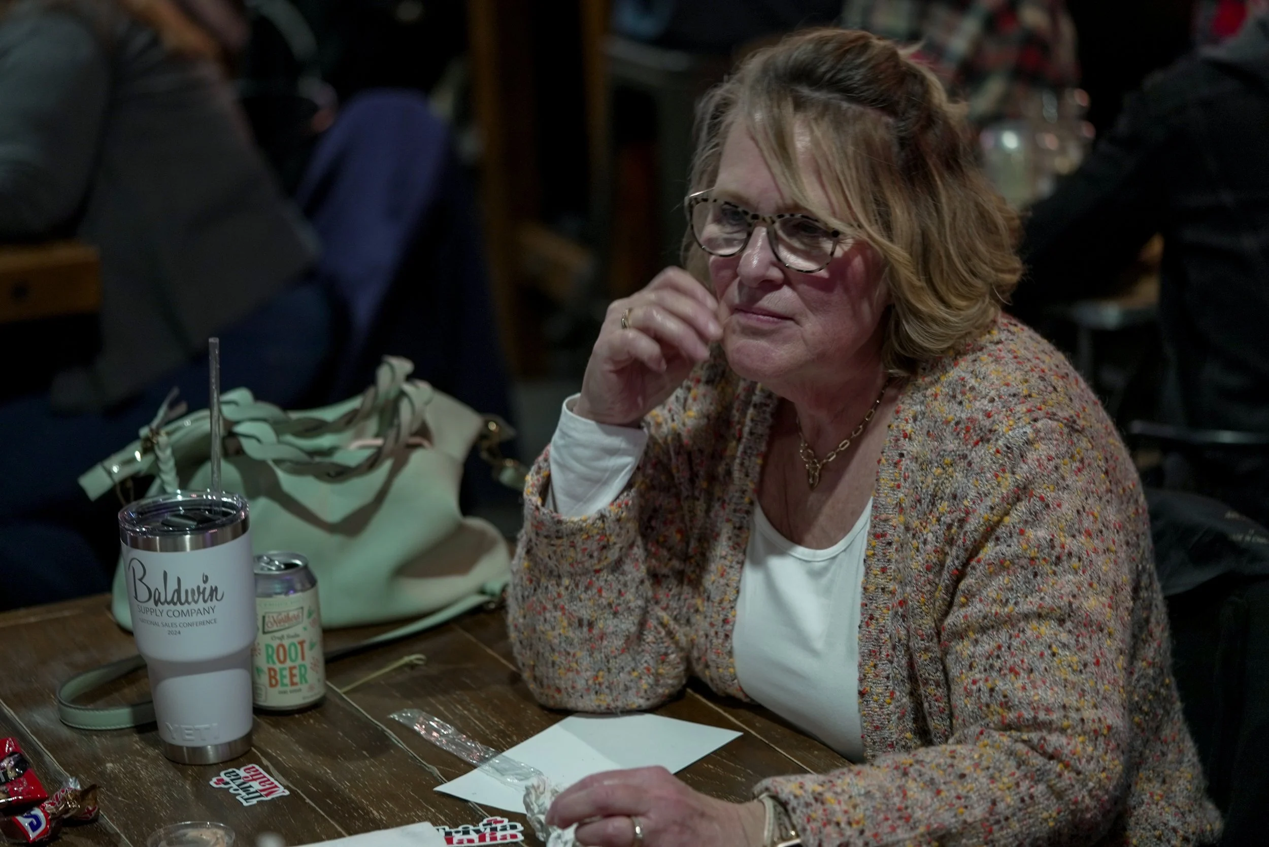 Lady judging the asnwer or question, likely.JPG