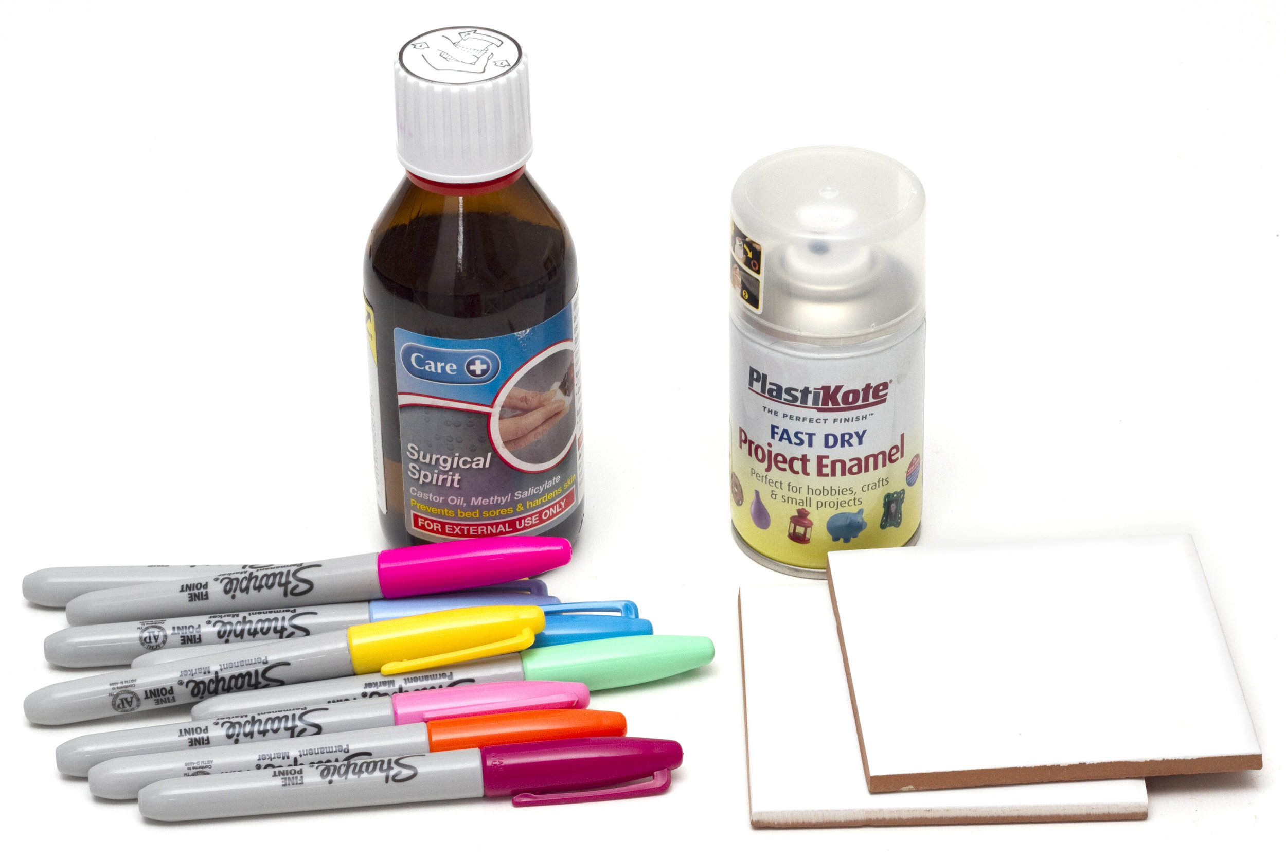 You will need: Sharpie pen markers Tiles (approx. 10cm x 10cm) Surgical Spirit (or alcohol) Varnish Felt Gluegun Scissors White paint