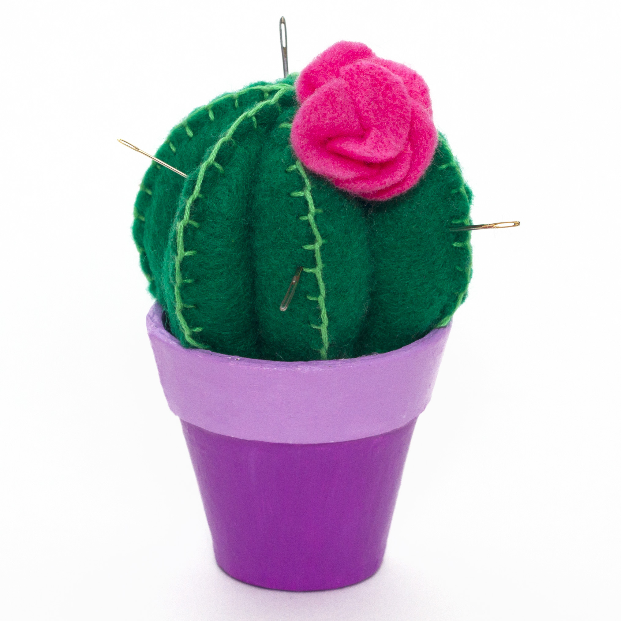 Step 5 Finally, sew the flower onto the cactus pin cushion. Paint the flowerpot if necessary to make it more colourful. Pop the cactus into the mini plant pot (glue it in if you don't want it to move, or leave it loose and keep spare pins and thread underneath!) Now you have a fun quirky cactus to keep all of your pins in for your crafting needs! Subscribe to my newsletter to receive fun craft ideas weekly!