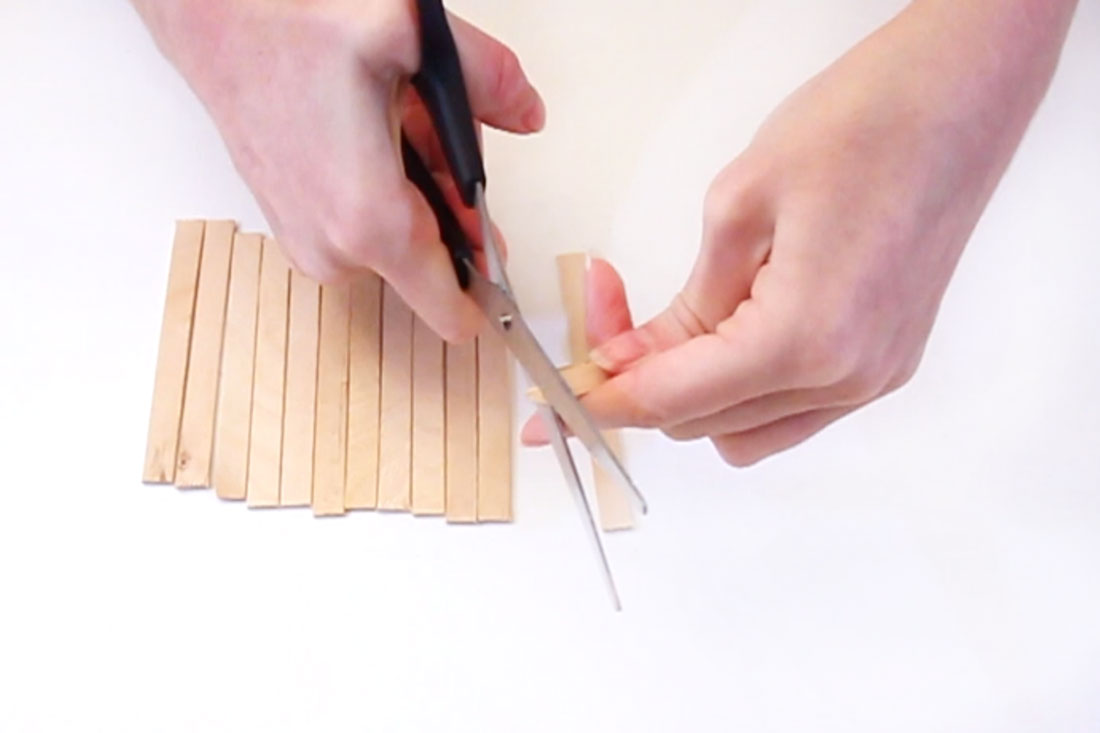 Step 1 Cut the rounded ends off of the lolly sticks. Be careful not to get splinters as the wood can be quite sharp! Sand them down in necessary.
