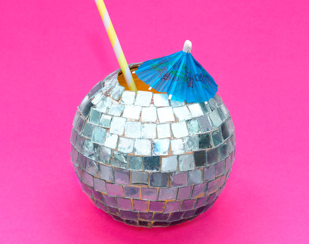 Step 3 Continue to stick the reflective squares from the CDs around the entire glass. Your disco ball drinks glass is now finished! Please note: this blog post contains affiliate links, however all opinions are my own and I only link to products that I personally use and recommend. Subscribe to my newsletter to receive fun craft ideas weekly!