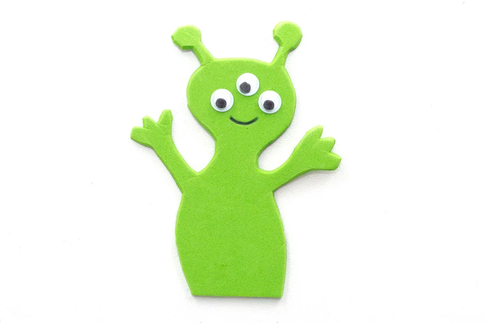Step 1 Cut out an alien shape out of the green foam or card. Add some eyes and a mouth, and any other decoration you want, to the alien.