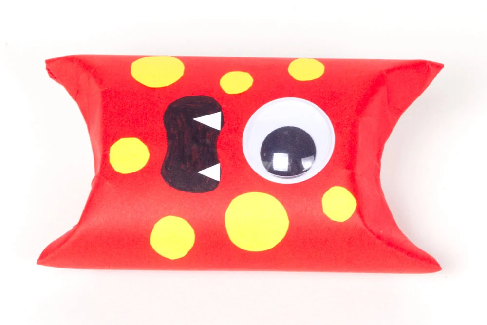 Step 3 Cut some small circles out of a yellow sheet of paper and glue them onto the cardboard tube. Stick a large googly eye onto the monster and then draw a scary mouth underneath with a black pen. Cut two small triangles out of some white paper and then stick them to the mouth to create the monster's teeth. Subscribe to my newsletter to receive fun craft ideas and freebies! Please note: this blog post contains affiliate links, however all opinions are my own and I only link to products that I personally recommend.