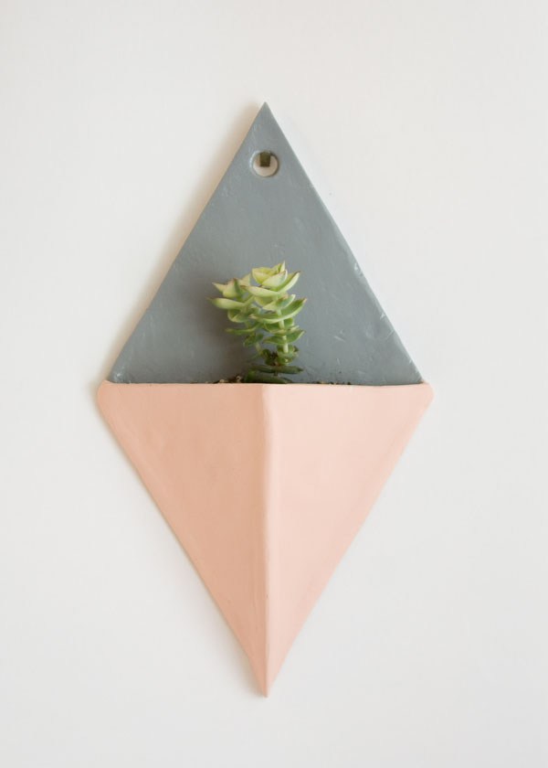 This air dry clay wall planter would make a lovely addition to your home decor! Instructions at Make and Fable .