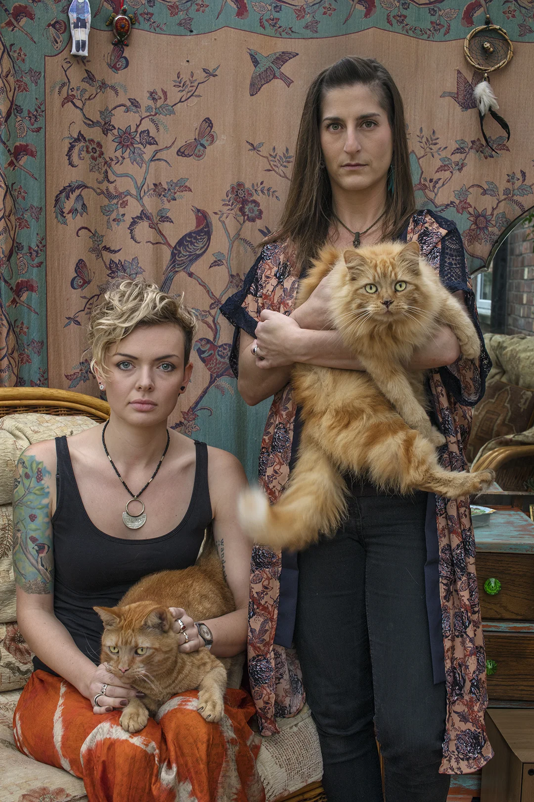 These portraits are of people who responded to an advertisement I posted on a Facebook group set up for cat owners in my local area. The aim was not to make images of cats per se, but rather the pet offered access into strangers’ homes and to possibly learn more about local people who had little more in common than owning a cat. Each portrait I took was a negotiation and a collaboration with my sitter, and the project offered me a way to connect with my local community in a way that is often hard to do today.