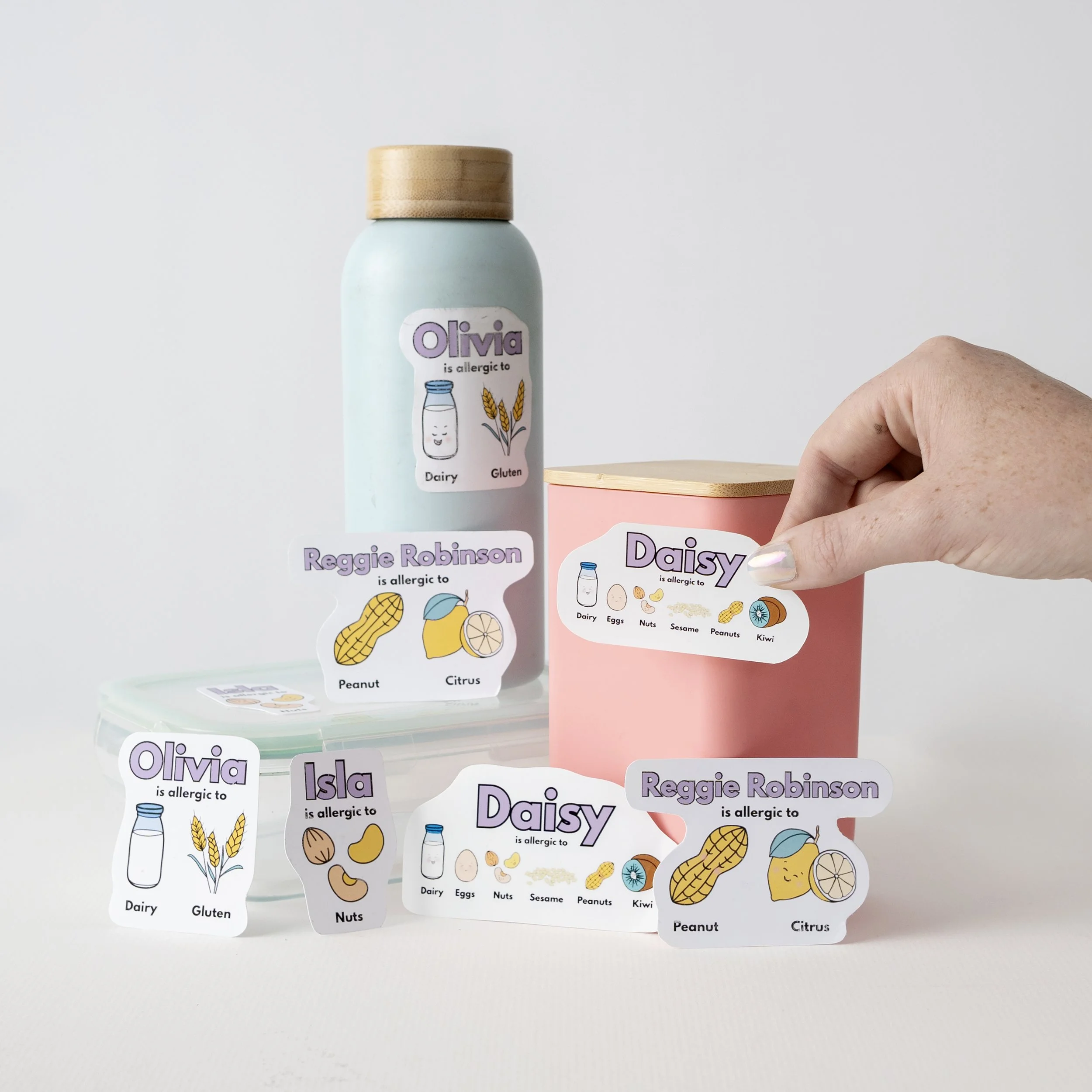 Allergy stickers being placed on a lunch box