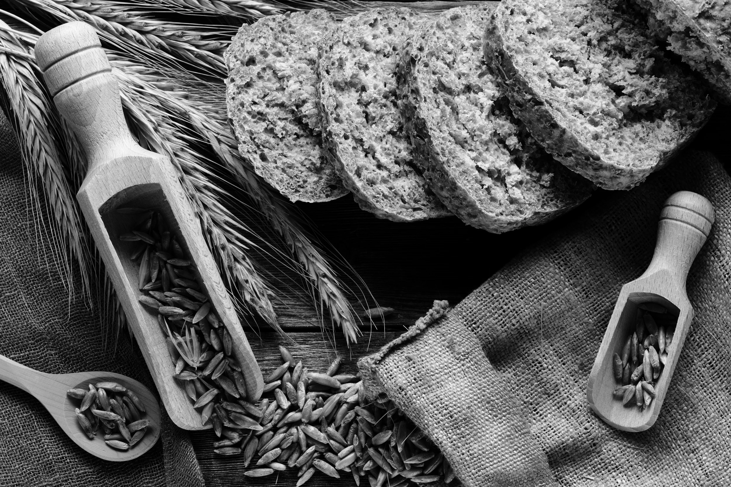bigstock-Rye-spikelets-and-bread-on-woo-50222246.jpg