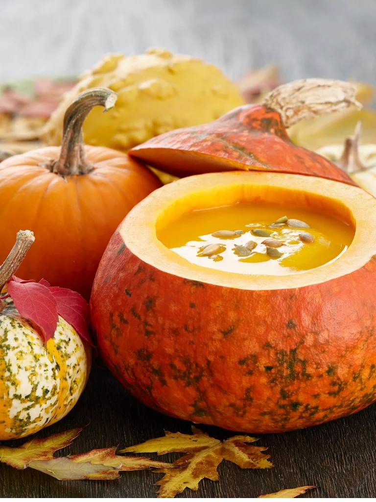pumpkin-soup-with-seeds-in-big-decorative-pumpkin-picture-id817388554 (1).jpg