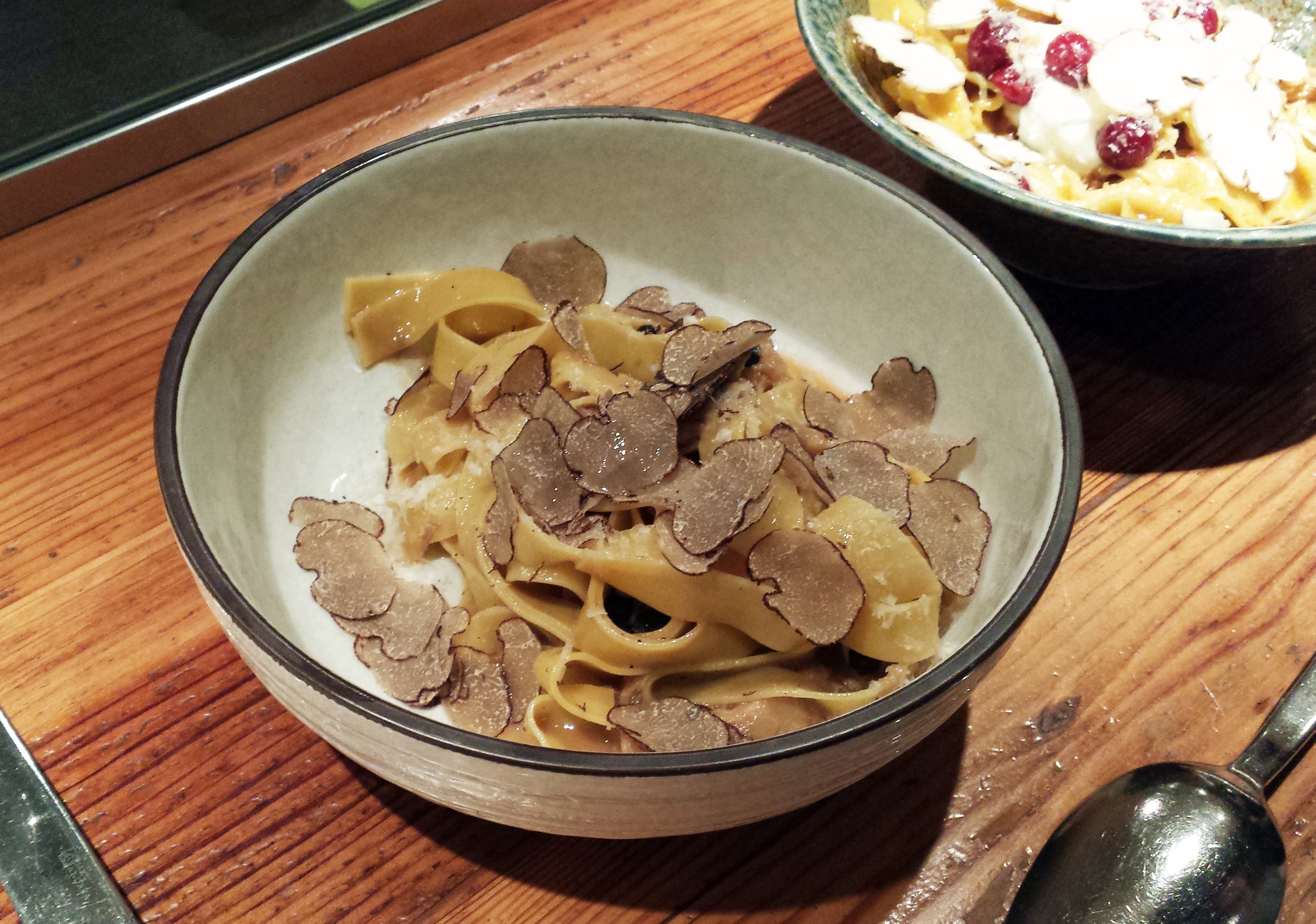 Pasta with shredded pork and shaved truffles
