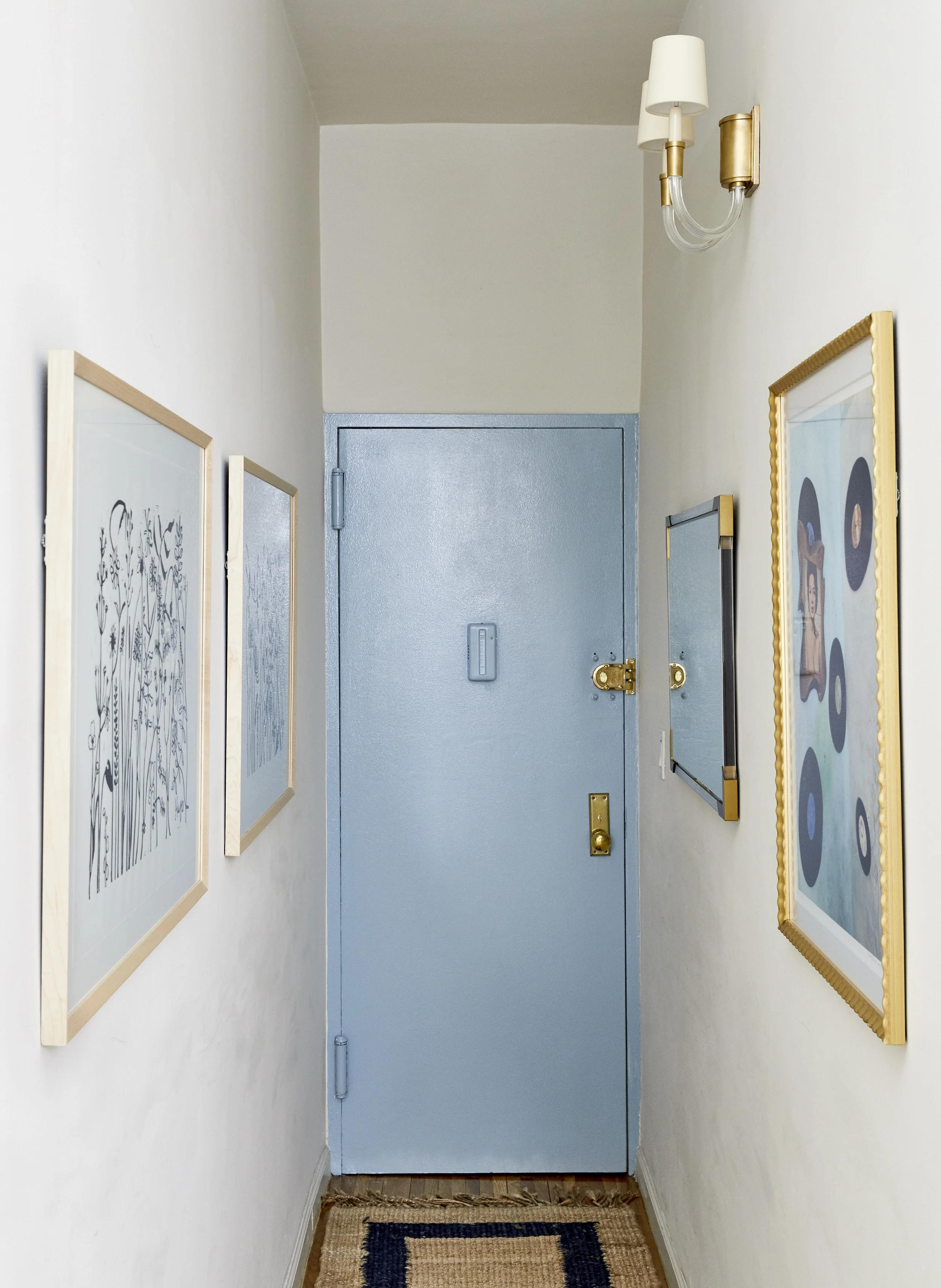 Entrance with light blue door.