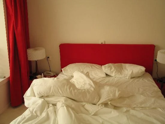 This is an unmade bed..... Image source withheld for shame reasons!