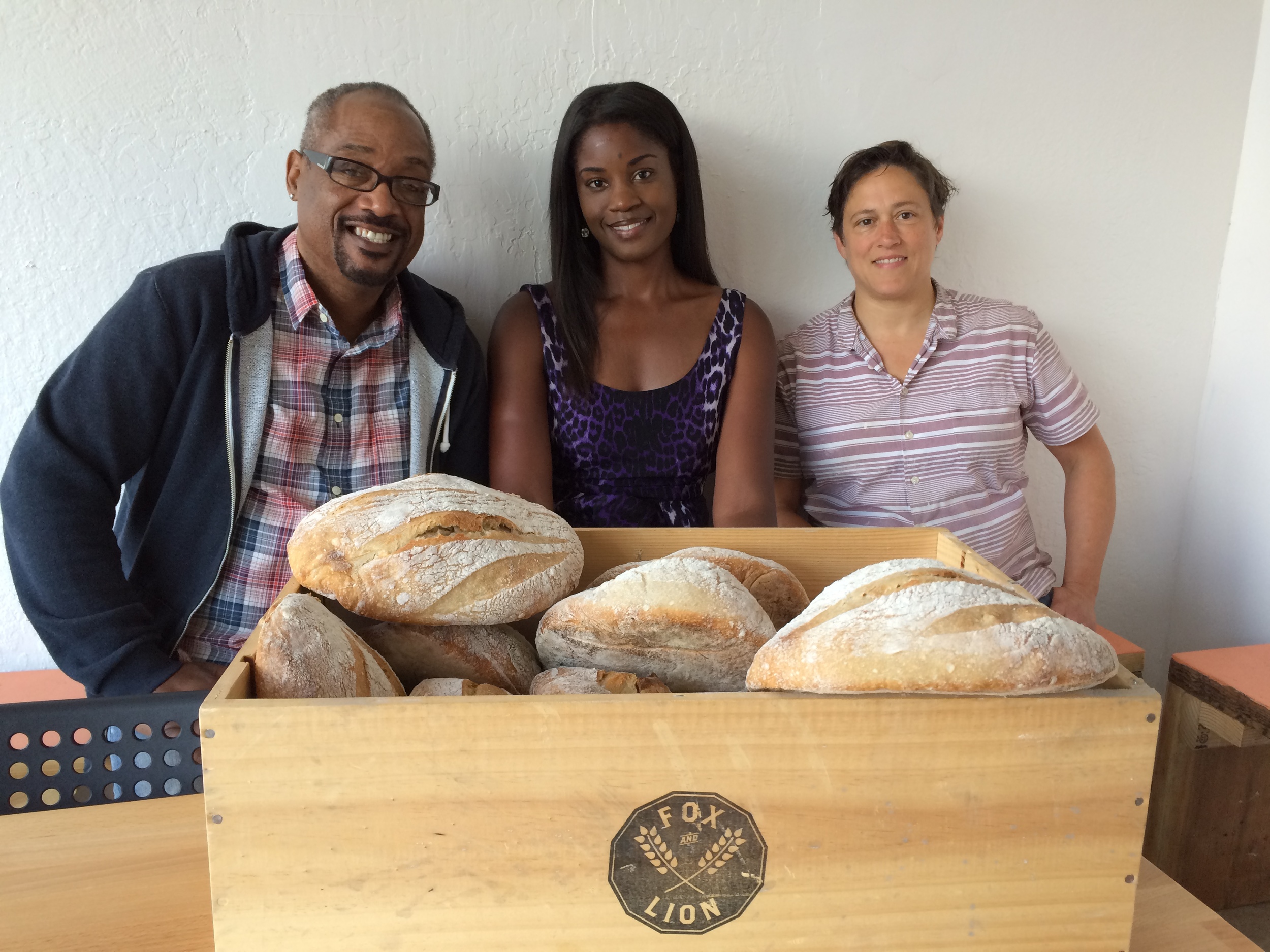 Bayview residents Julius Crane and Tyra Fennell with Xan DeVoss, owner of the new Fox & Lion bakery on Third Street.