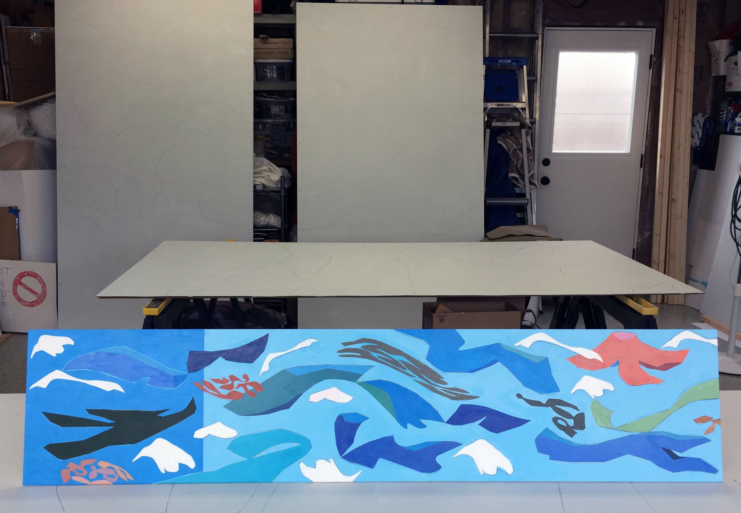 The finished mock-up for the corner mural (a few primed panels in the background)