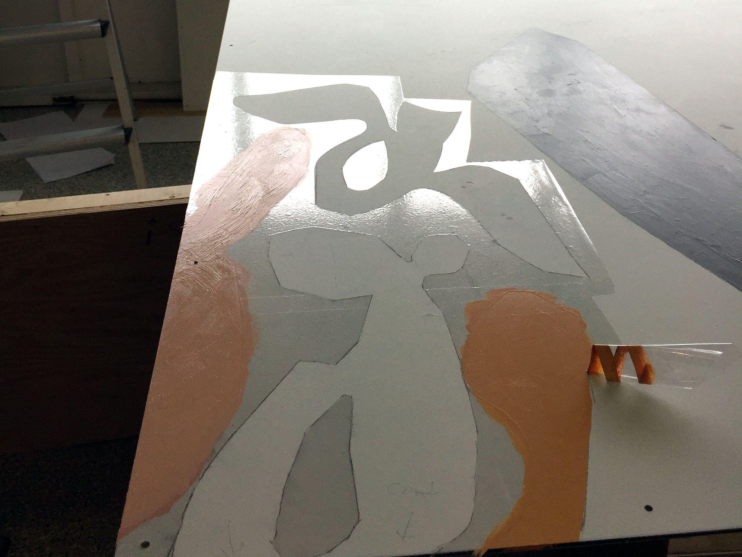 The cycle: mix paint, cut mask, paint, peel mask off, repeat...