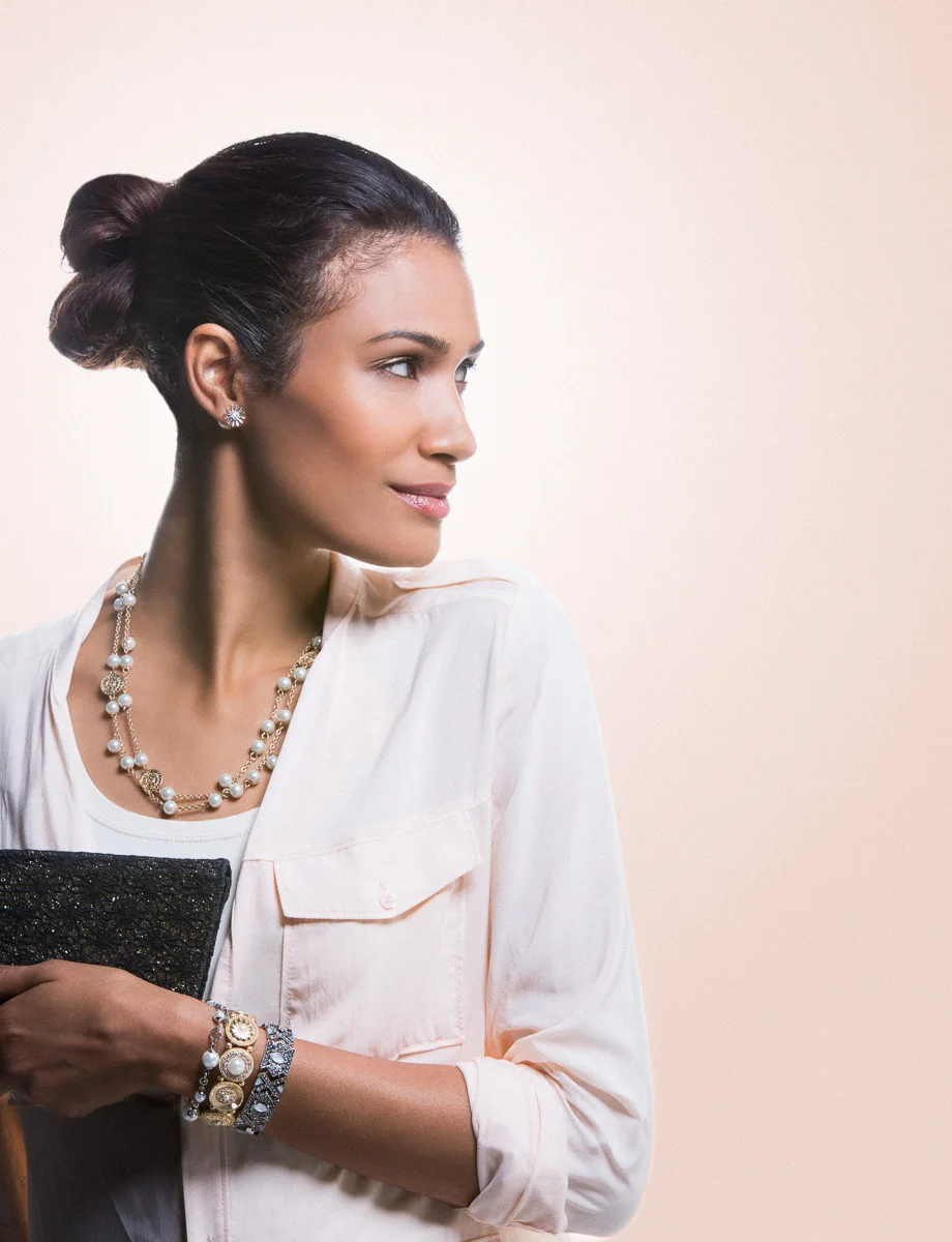 Woman with clutch studio commercial photography