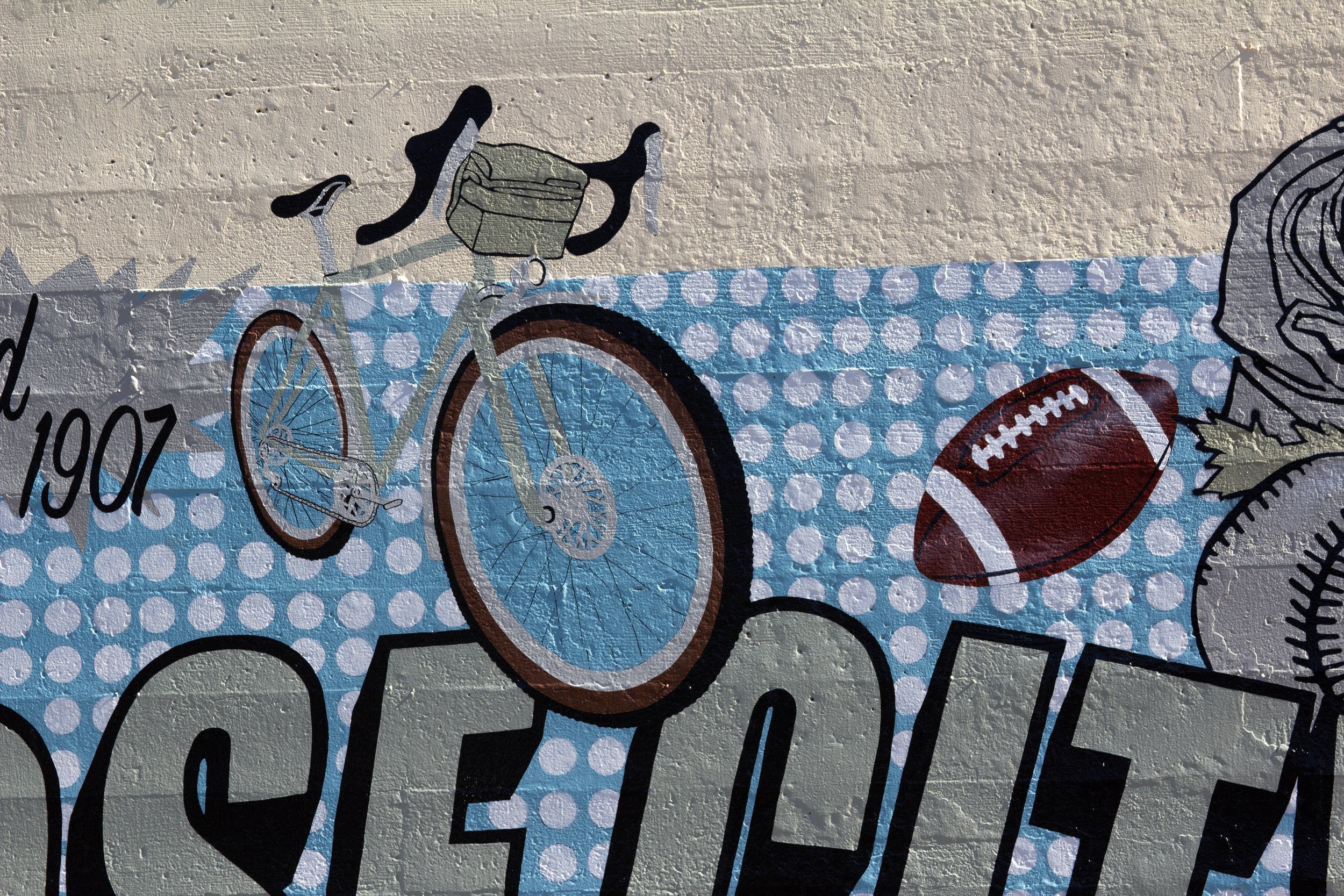 Mural designed and painted by local Portland artist Chet Malinow. Rose City Park neighborhood mural in Portland, Oregon. Biking, football, baseball, softball, golf.