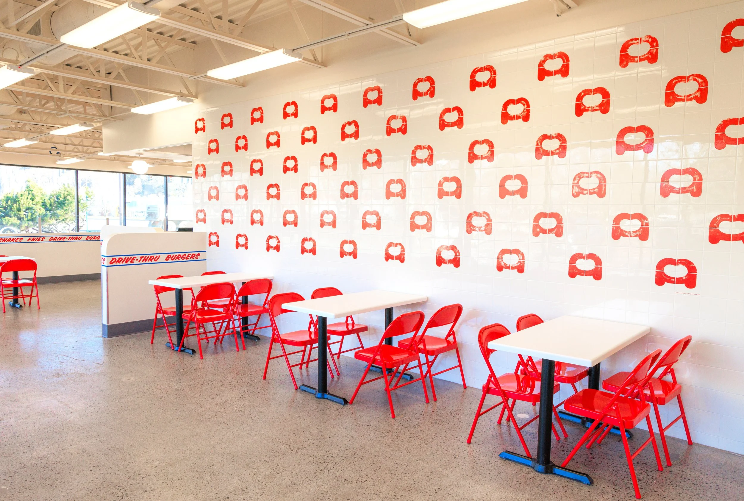 Face Plant mural by Chet Malinow. Composition by Portland-based artist Chet Malinow. Illustration. Corporate Art. Wayfinding. Office Art. Office Mural. Corporate Mural. 1shot enamel. Fast food. Hospitality art. Corporate Art.