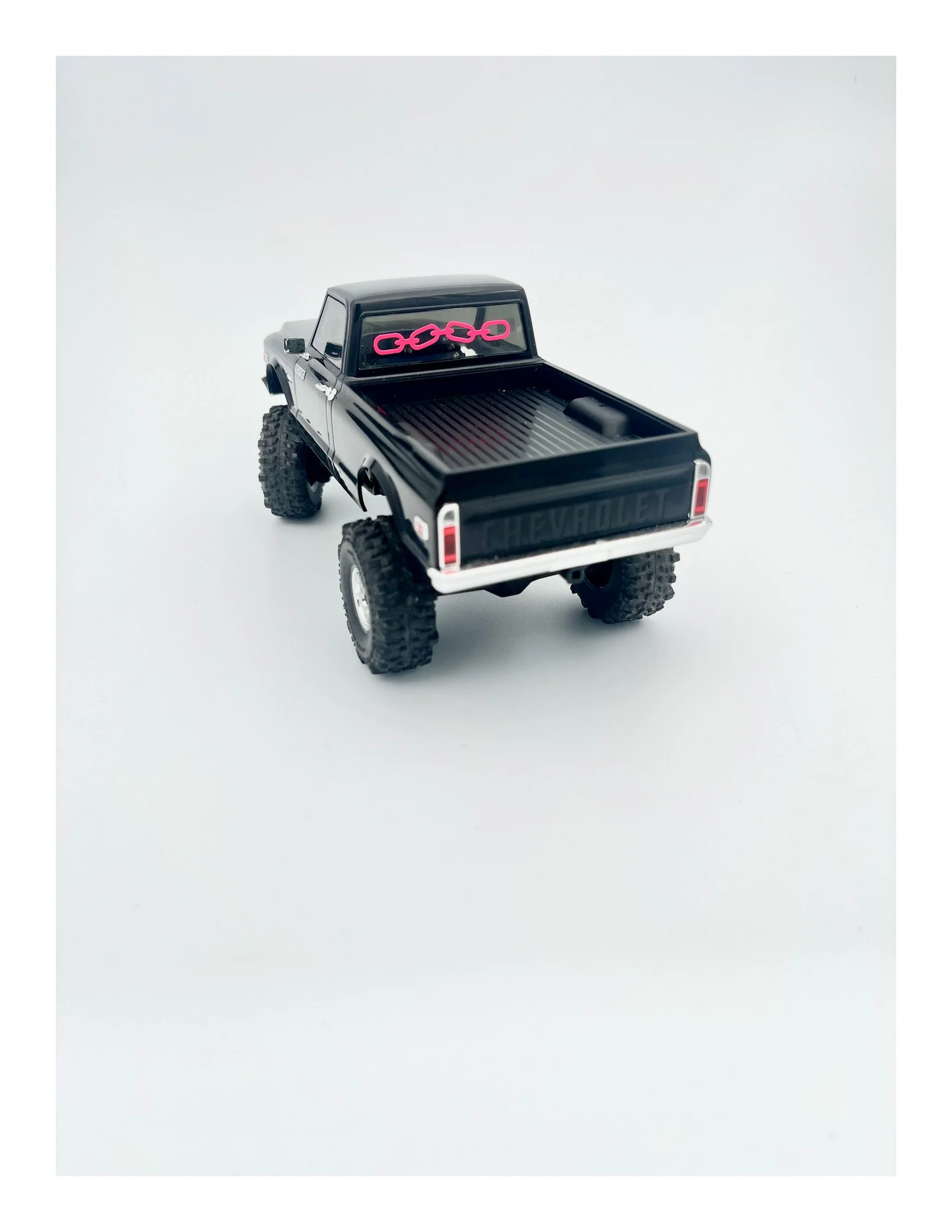 Chain sticker on RC car. Vintage chevy C10 RC car with sticker designed by Chet Malinow