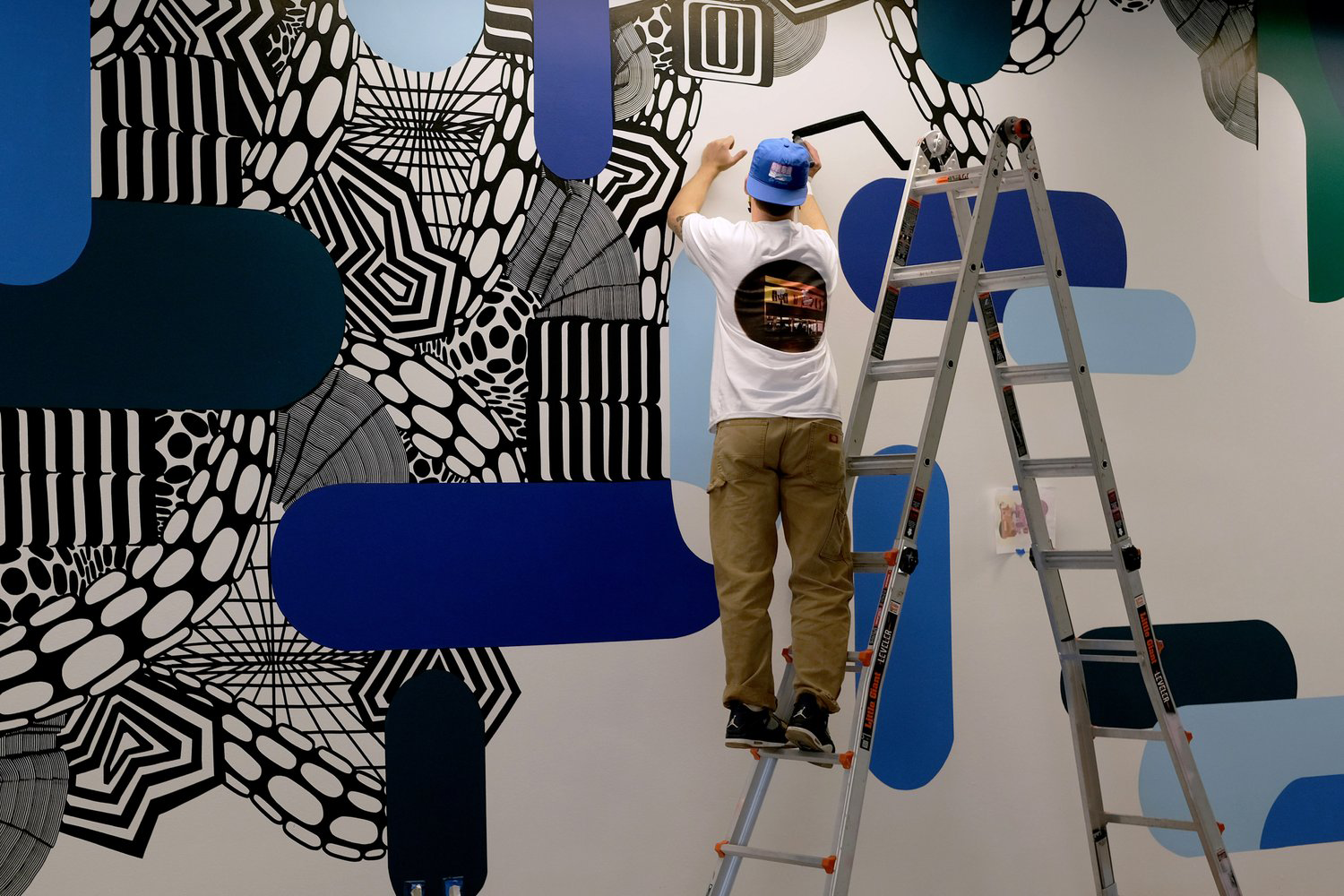 composition by Portland-based artist Chet Malinow. Illustration. Corporate Art. Wayfinding. Office Art. Office Mural. Corporate Mural.