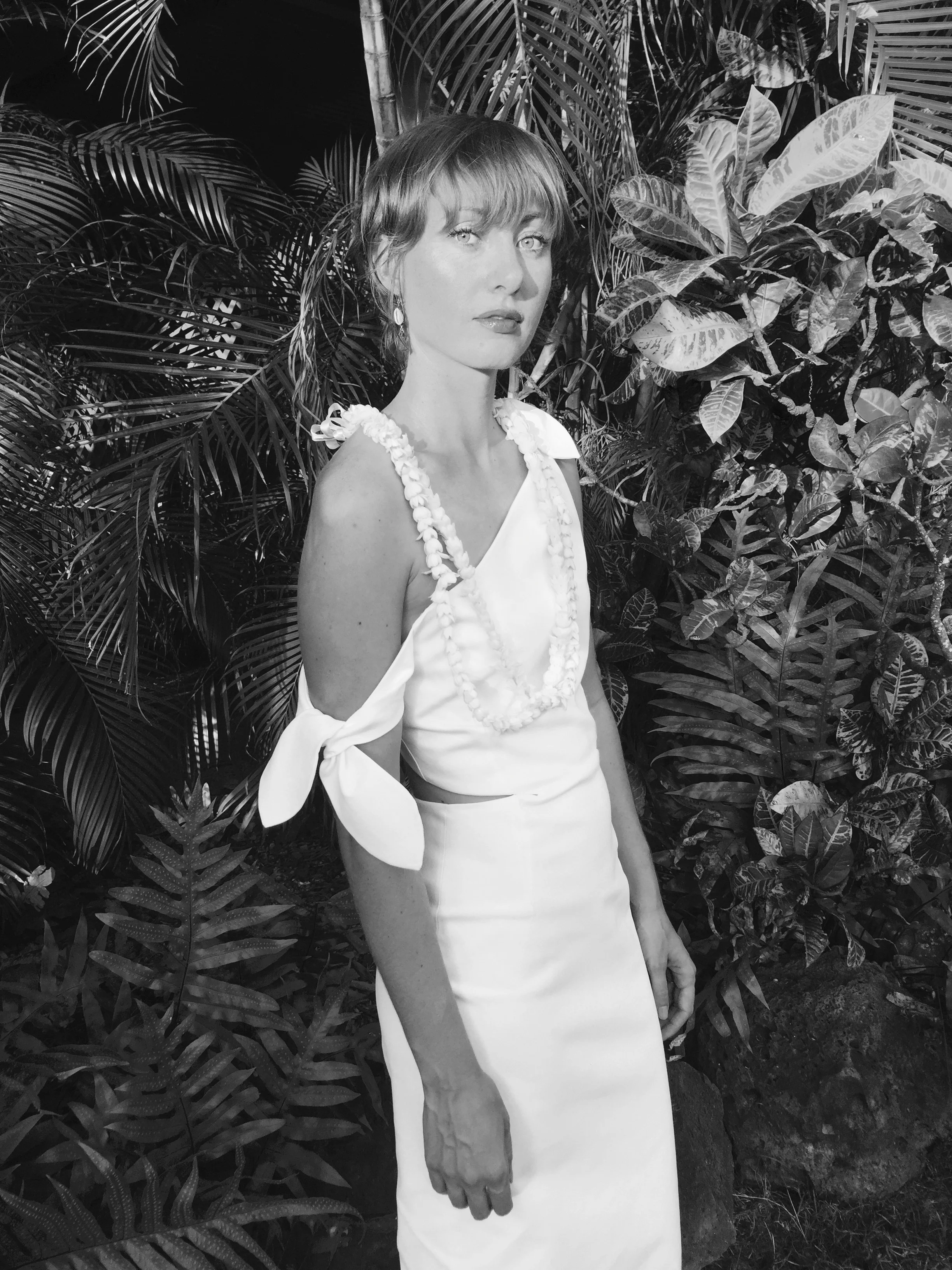 Anna in custom cocktail dress at her Hawaii reception.