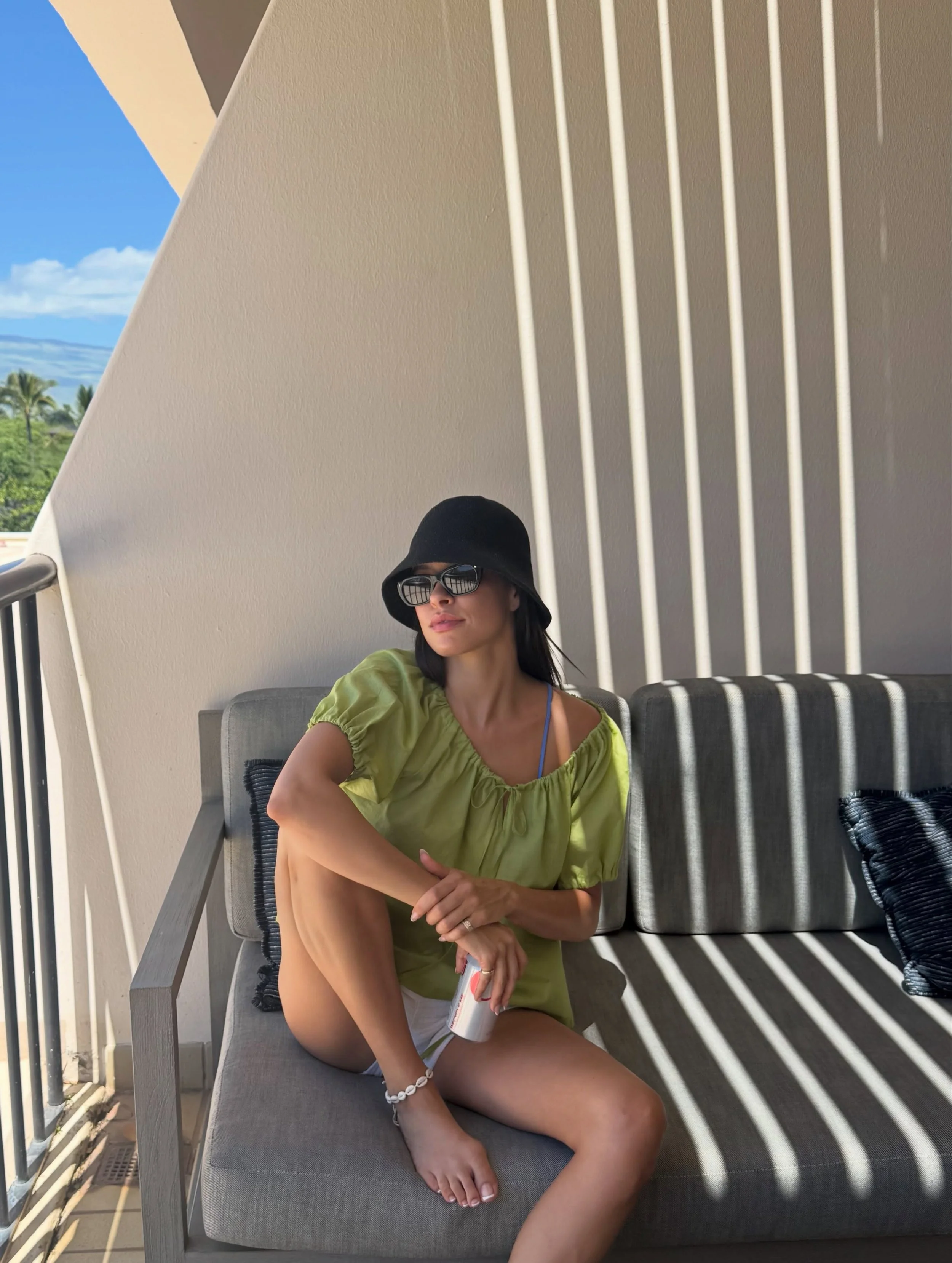 Emily in her summer staple: the Aurora Top ☀️