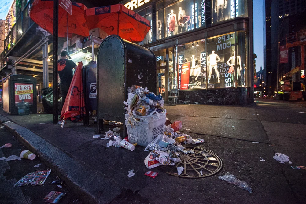 Trash piles in Times Square, New York City 6 am.