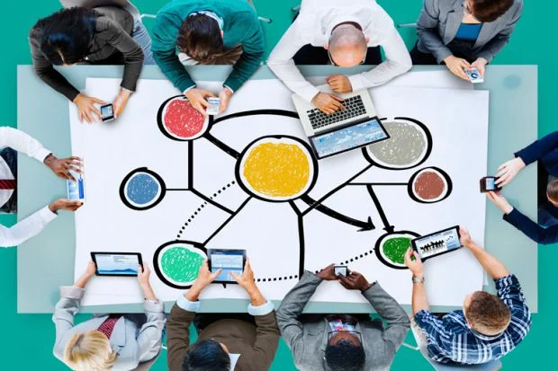 students-sharing-data-using-mobile-devices.jpg