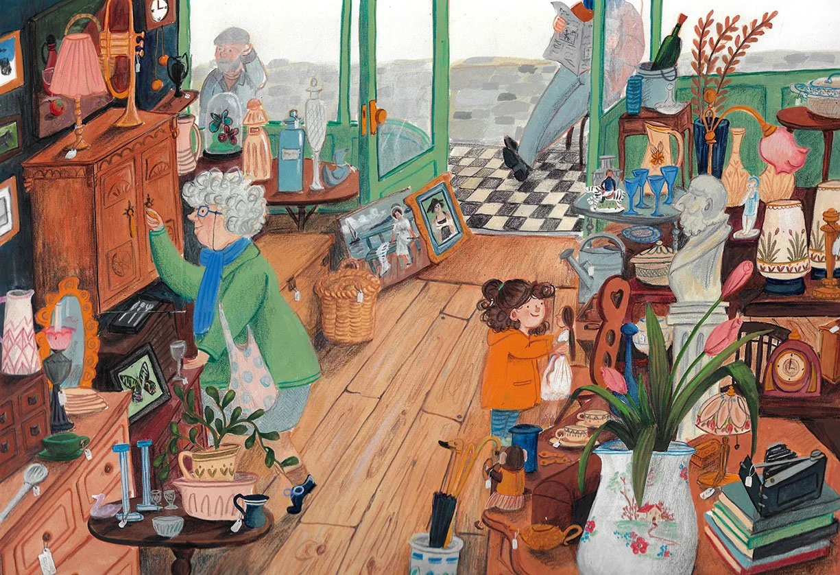 Inside a cozy antique shop filled with various vases, paintings, and decorative objects. An elderly woman with curly gray hair and glasses, wearing a green jacket and blue scarf, is browsing items. A young girl in an orange jacket is holding an item, smiling. A person outside in a gray hat and coat is standing near the door, while another person is reading a newspaper. The shop has wooden floors, a checkered floor outside, and an open door letting in natural light.