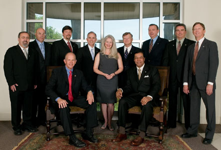 Pictured from back left: Ali Mustapha, Ted Thompson, Miles Williams, Richard Savoie, Norma Jean Mattei, Richard Danzy, Jim Bowie, Tim Allen, Ernie Gammon, Mark Jusselin, Rhaoul Guillaume