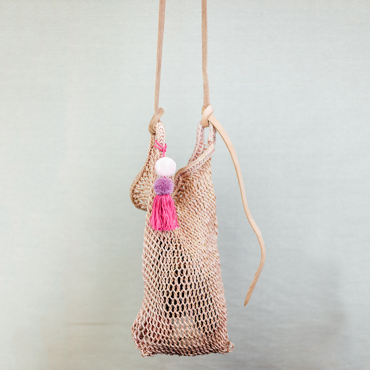 Mexico_Handwoven_MagueyBag_PinkConchineal_ArtisanAndFox_PomPom_Large.jpg