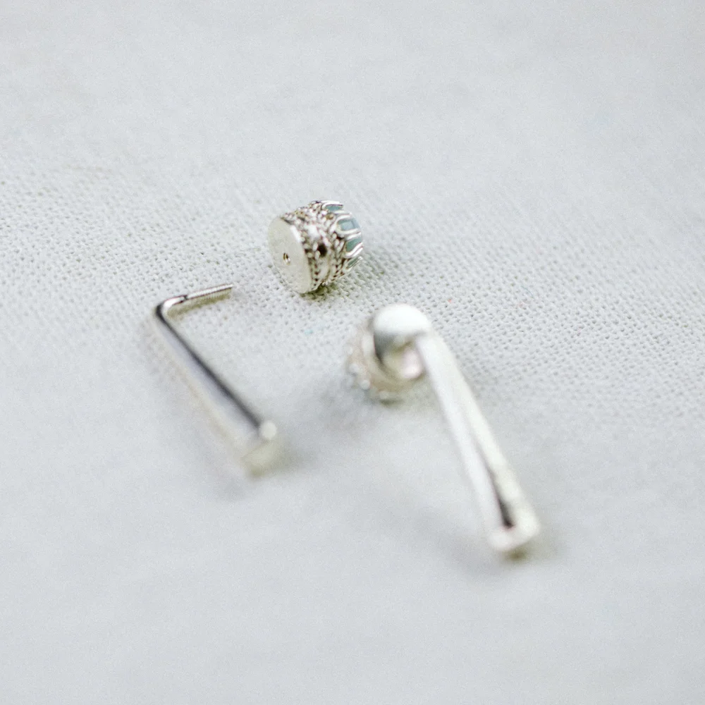 Vietnamese marble jewellery in powder blue by Artisan & Fox. Unique screw mechanism earrings.