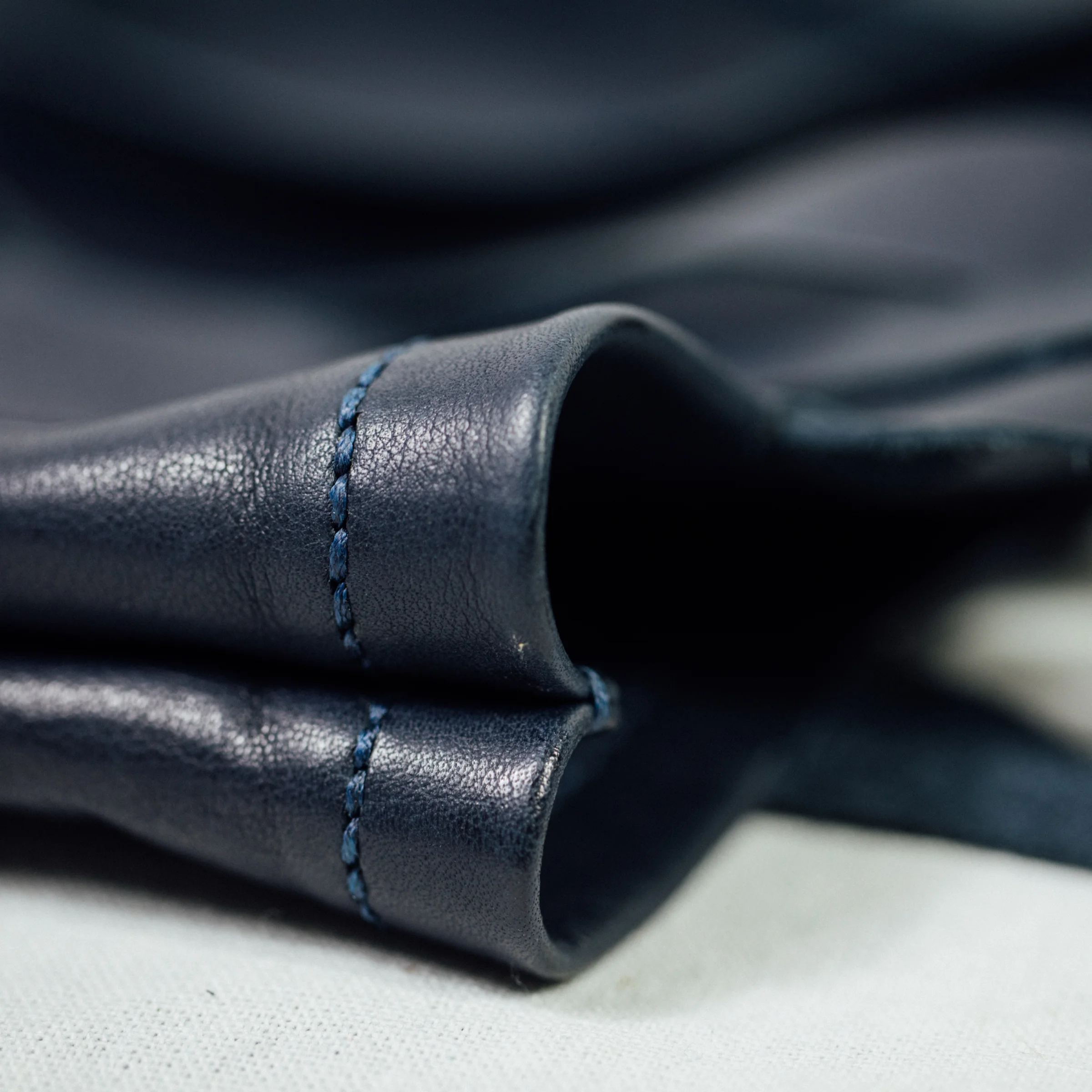 Vietnam_EthicalLeatherBags_EthicalFashion_SACH_Leather_Tote_NavyBlue_SideView.jpg