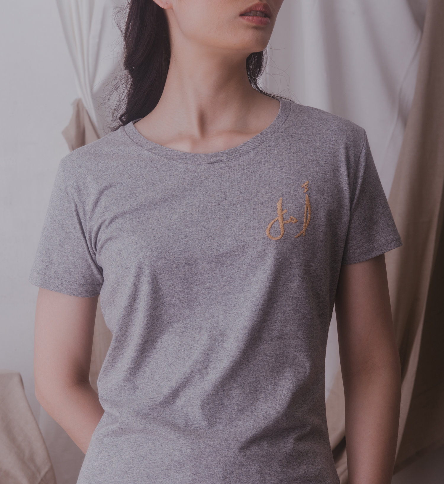 The  ‘Amal’ Cotton Tee in Grey .