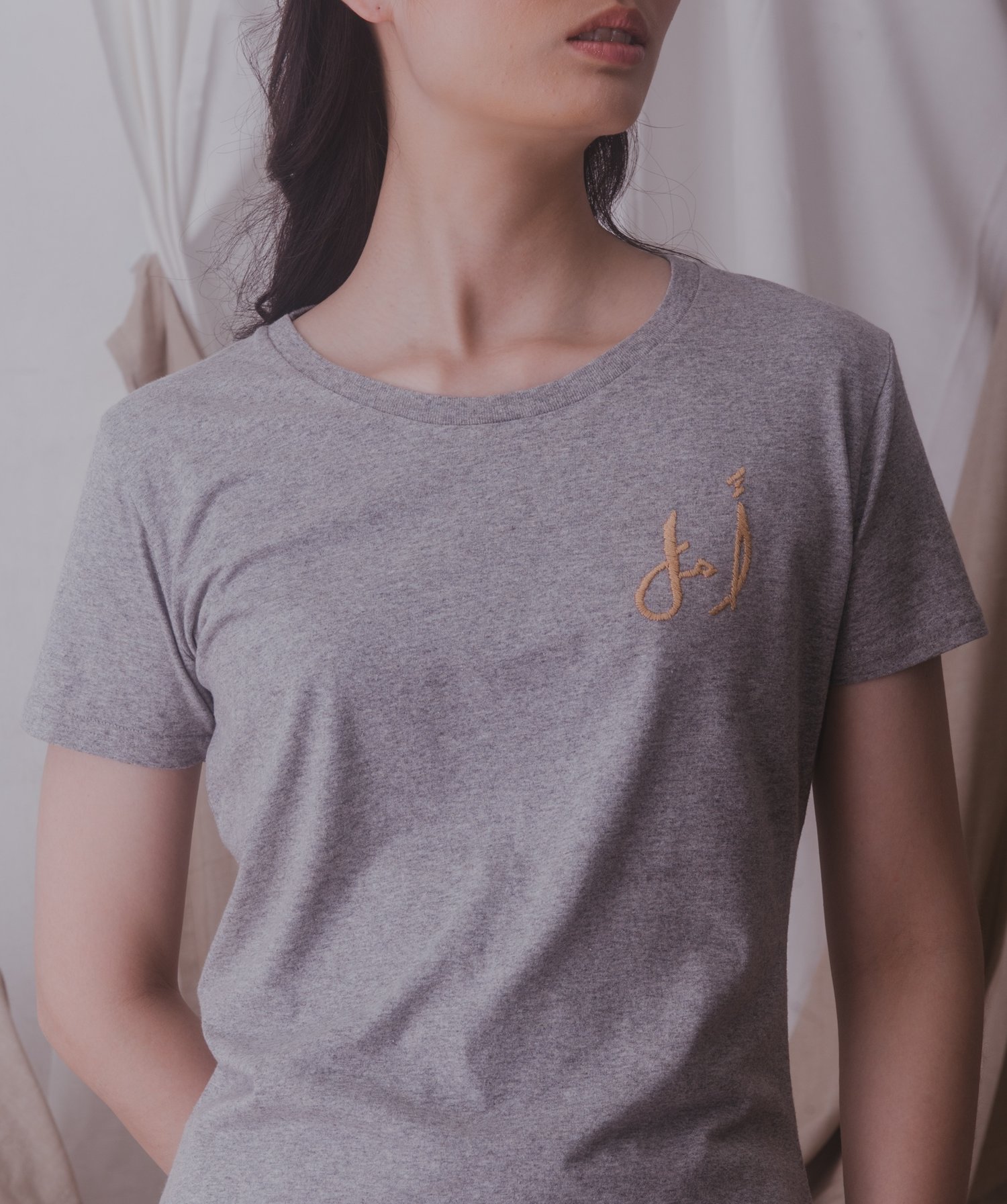 The  ‘Amal’ Cotton Tee in Grey .