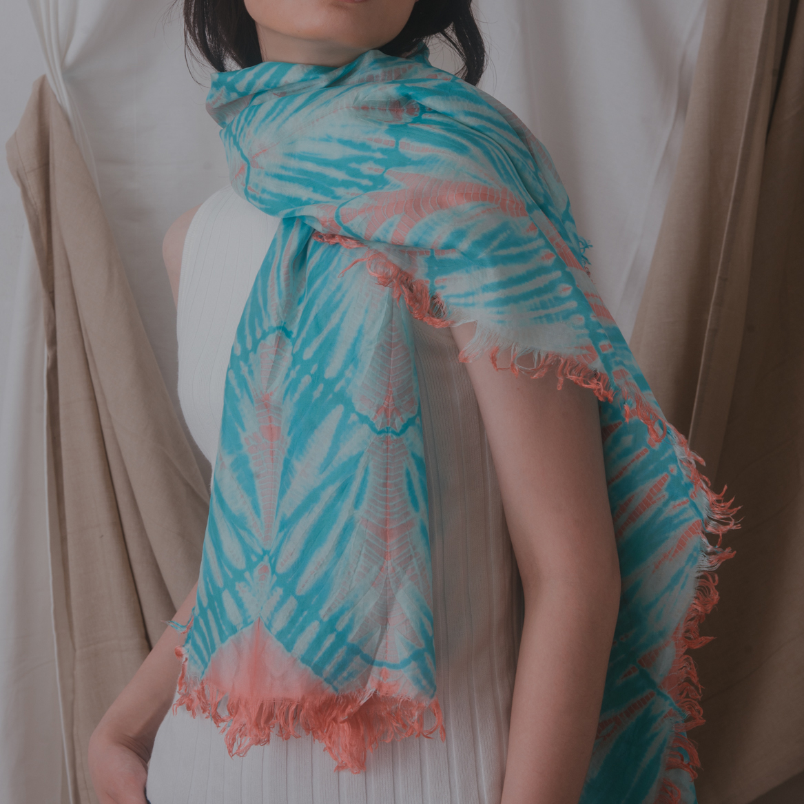 The Living Coral Scarf , made in Cambodia.