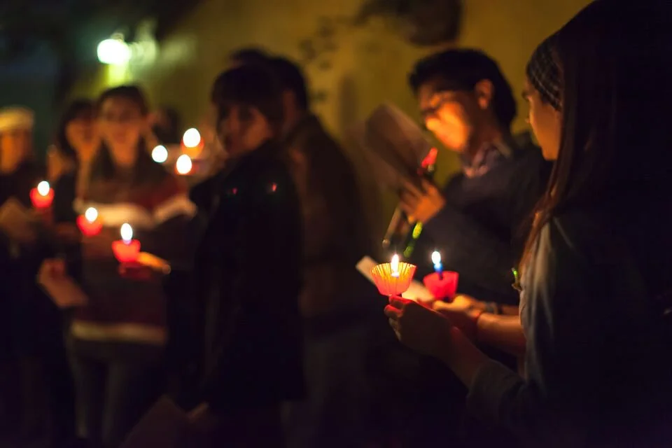 Families participating in a posada. Photo: TripSavvy.