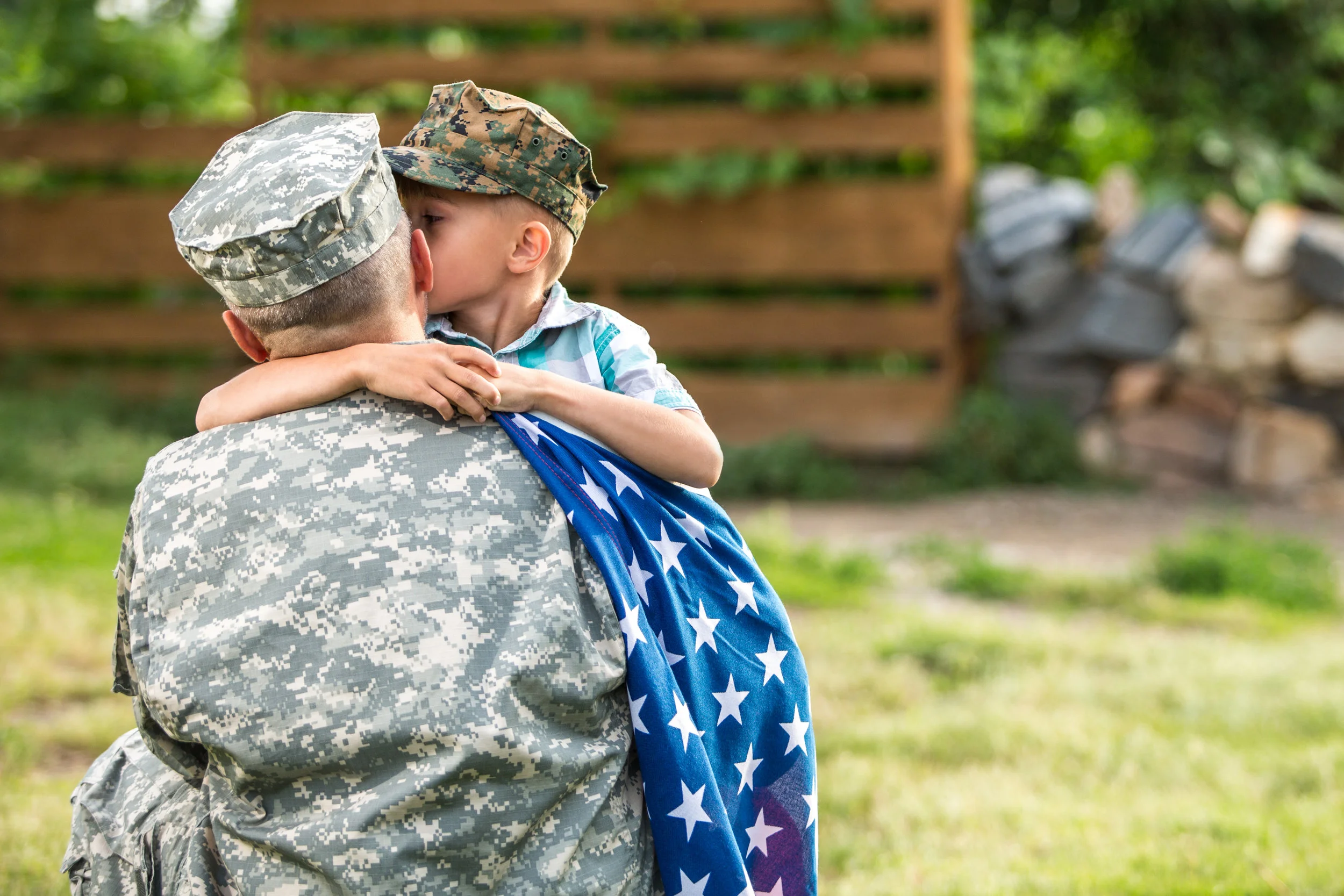 Military Father Hugs His Son