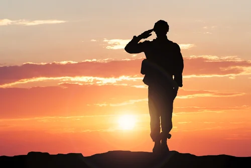 Silhouette of a Soldier Saluting