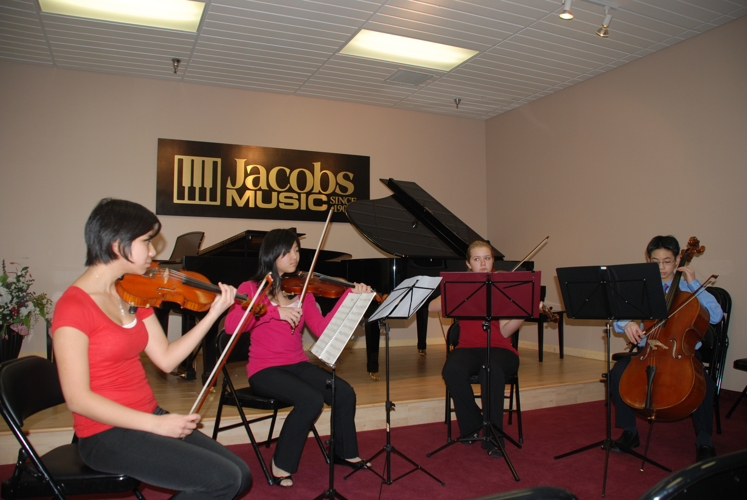 Quartet performing Handel's Hornpipe
